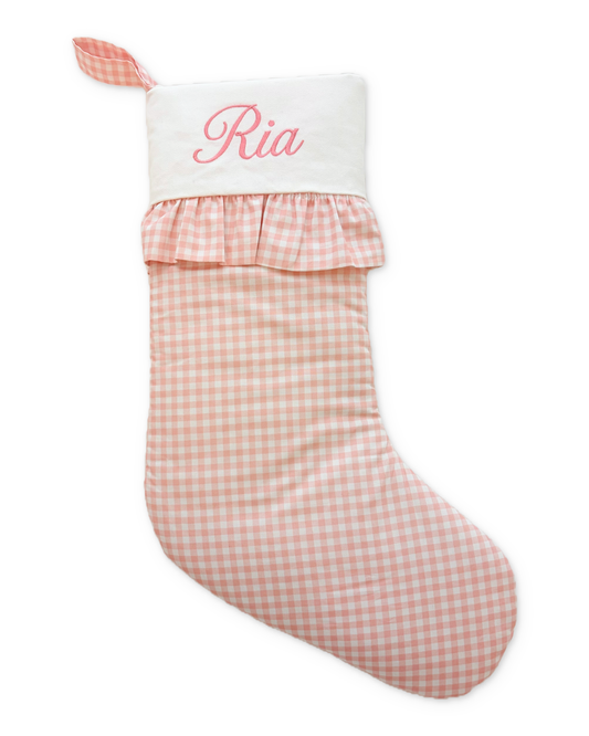 Peony stocking with its original Ria embroidery and photographed ruffled cuff, on white with a subtle shadow.