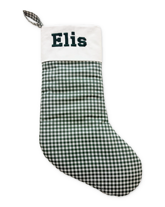 Pine stocking with its original Elis embroidery and photographed classic cuff, on white with a subtle shadow.